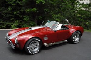 Our Cobra with the Repainted Goodyear Billboard Tires Installed